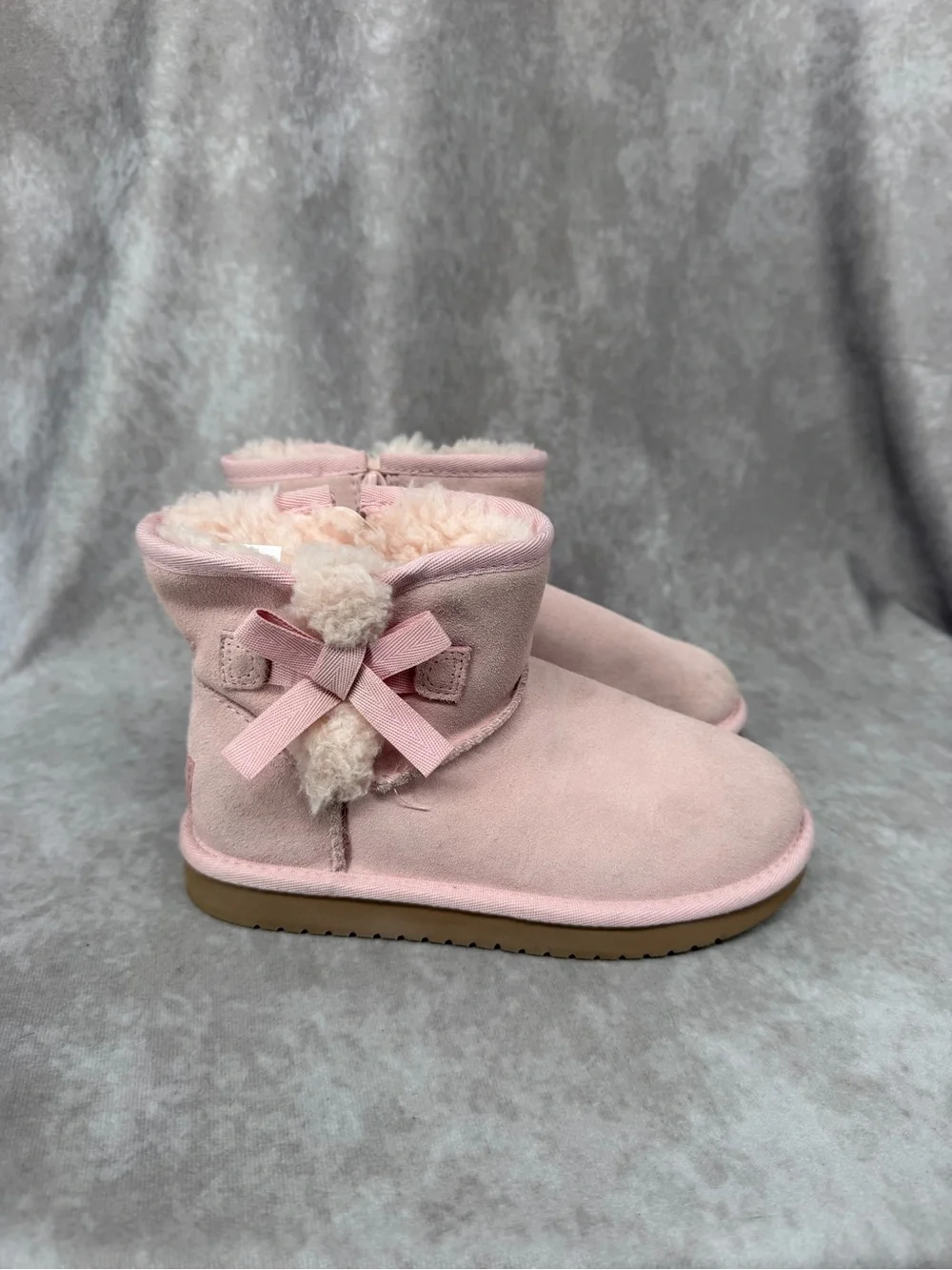 Koolaburra Pink Faux-Shearling Ankle Boots with Pom Detail